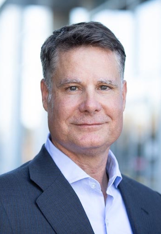 Portrait of Andrew Dickinson, CFO of Gilead Sciences, Inc.